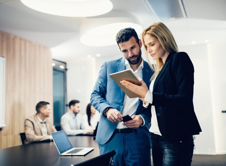 Business colleagues having meeting in conference room in modern office